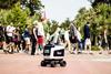 The food delivery Kiwibot appears to be automated, but is actually operated by remote workers being paid $2 an hour